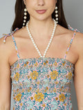 Ausgestelltes Kleid aus gesmoktem Baumwollgewebe mit Blumenmuster für Damen