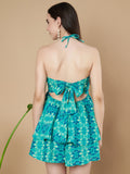 Combinaison turquoise à col licou pour femme